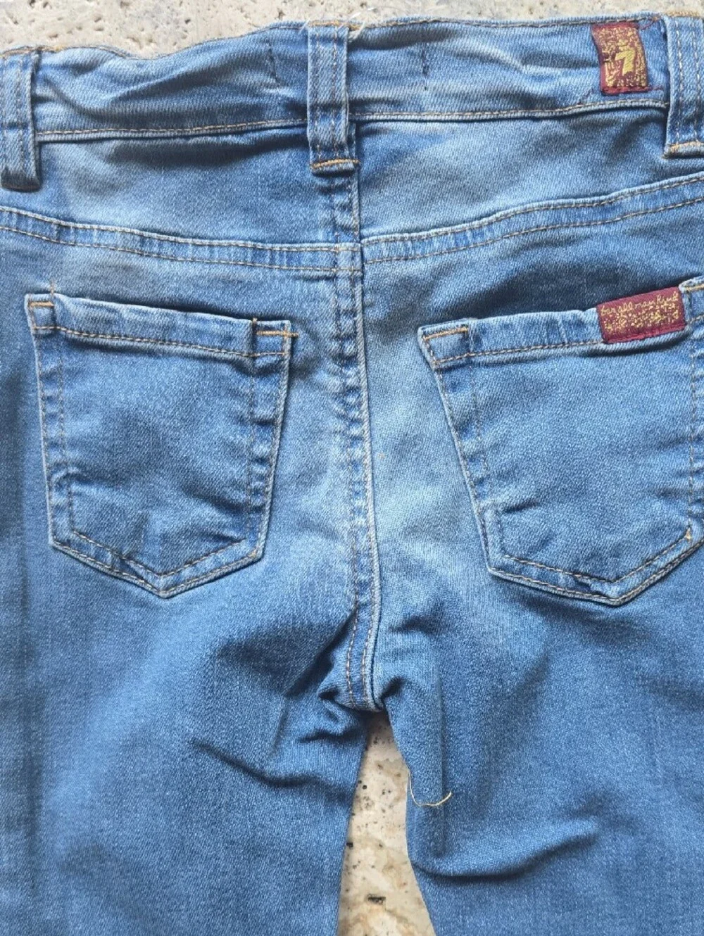 7 For All Mankind includes navy